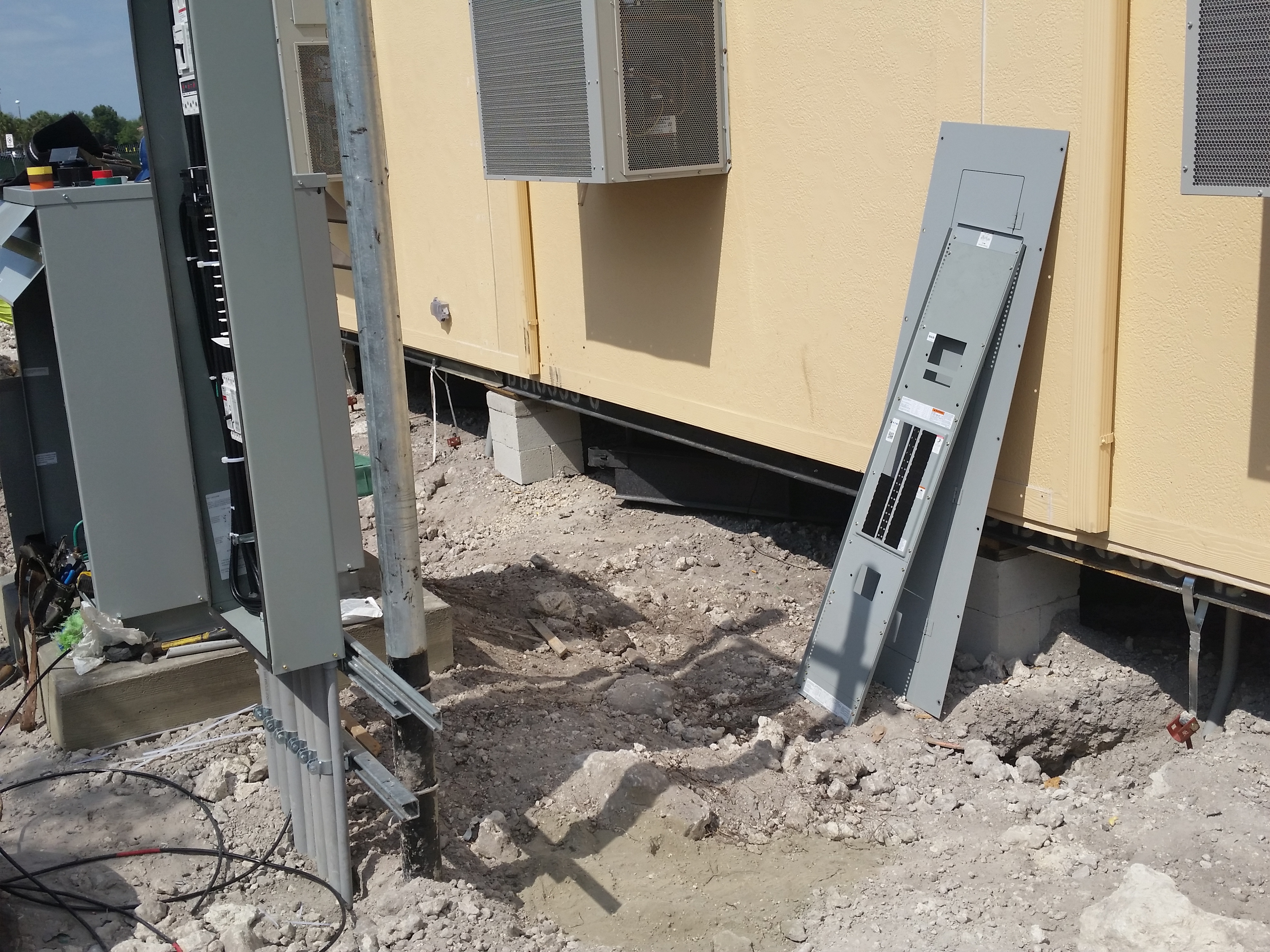 Modular building installation and utility hookup.