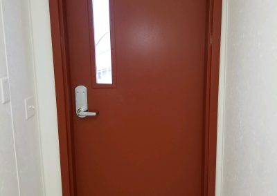 High impact steel exterior door in modular fire station