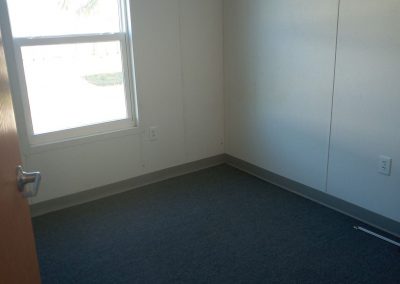 Dormitory bedroom in sleeping quarters in modular fire station building