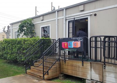 Exterior photo of modular daycare building with stairs